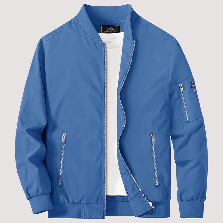 "Blouson bomber léger homme printemps, coupe moderne, fermeture éclair visible, idéal pour brises printanières."