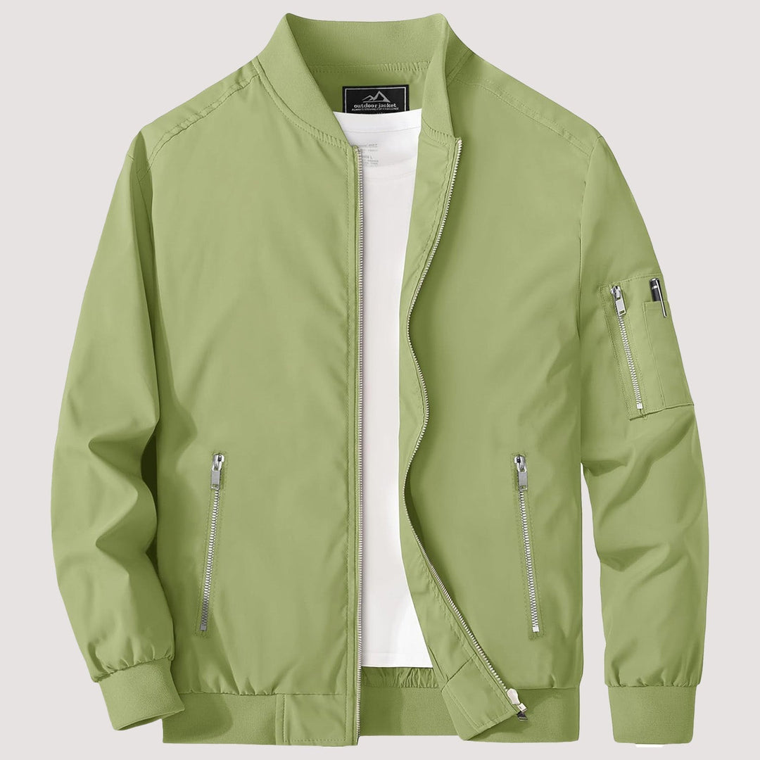 "Blouson bomber léger homme printemps, coupe moderne, fermeture éclair visible, idéal pour brises printanières."