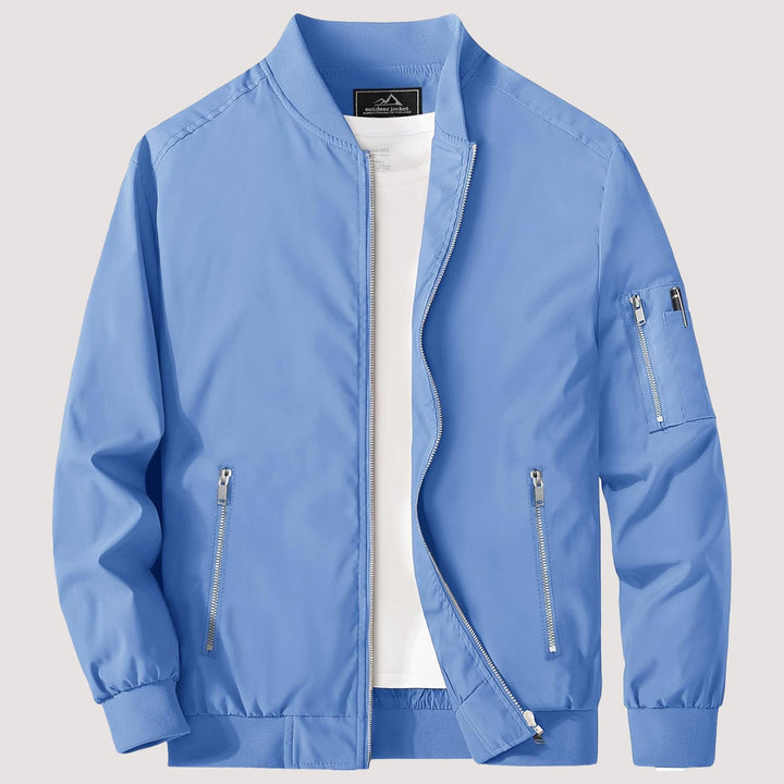 "Blouson bomber léger homme printemps, coupe moderne, fermeture éclair visible, idéal pour brises printanières."