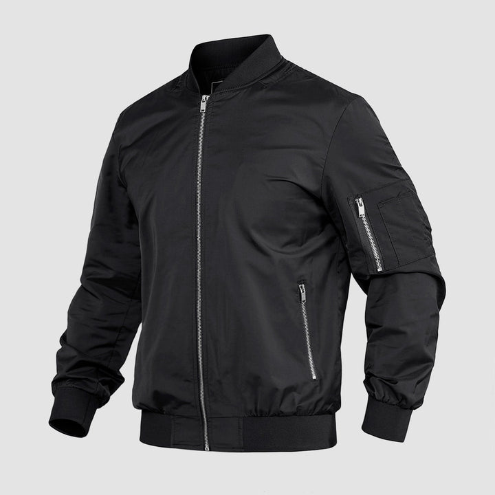 "Blouson bomber léger homme printemps, coupe moderne, fermeture éclair visible, idéal pour brises printanières."