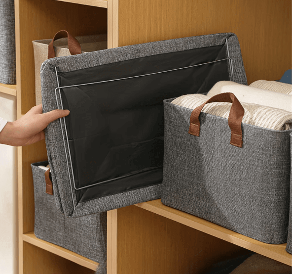 Boîte rangement vêtements pliable grande capacité.  Rangement optimal, tissu robuste, poignées solides.