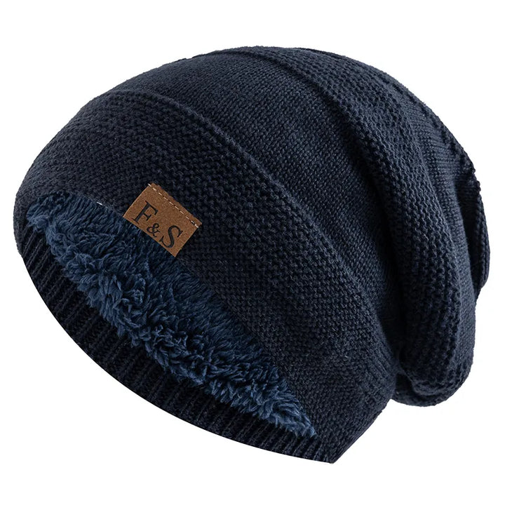 "Bonnet polaire luxe pour femmes en bleu marine, doux et chaud, parfait pour l'hiver et occasions décontractées ou formelles.