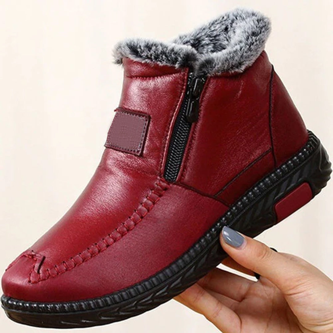 Bottes hiver femme Angela grises, chaudes et pratiques avec fermeture éclair latérale, parfaites pour le froid.