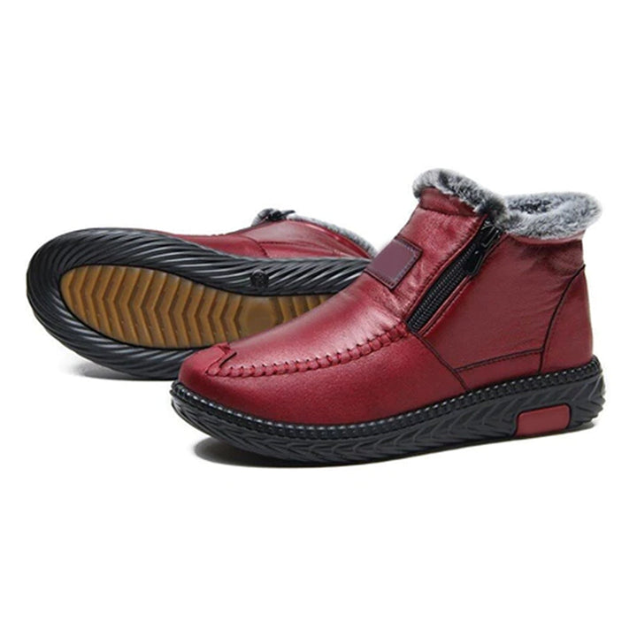 Bottes Angela pour femme en cuir, élégantes et résistantes, assurant confort et chaleur durant tout l'hiver.