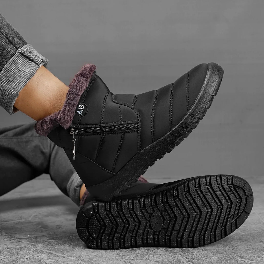 Bottes de neige robustes pour hommes offrant protection et confort ultime en extérieur.