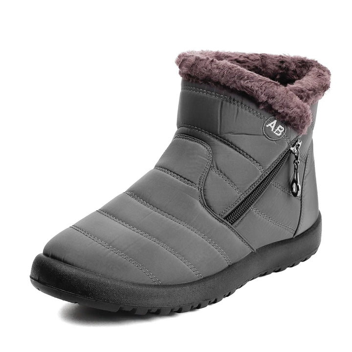 Bottes de neige chaudes et protectrices pour hommes, conçues pour le confort en hiver.