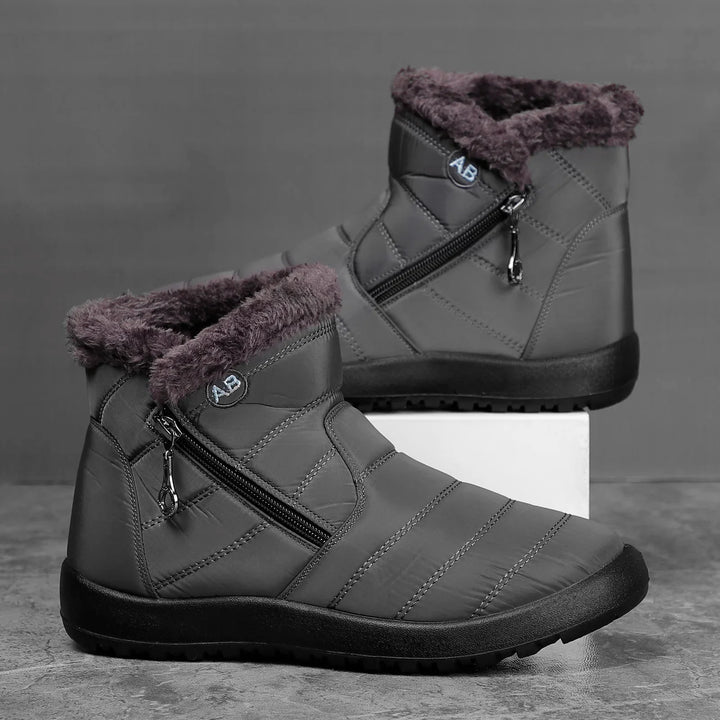 Paire de bottes d'hiver robustes pour hommes, élégantes et confortables pour le grand froid.