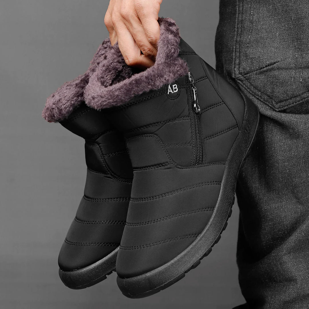 Bottes d'hiver homme avec semelle antidérapante, offrant protection et adhérence sur neige.