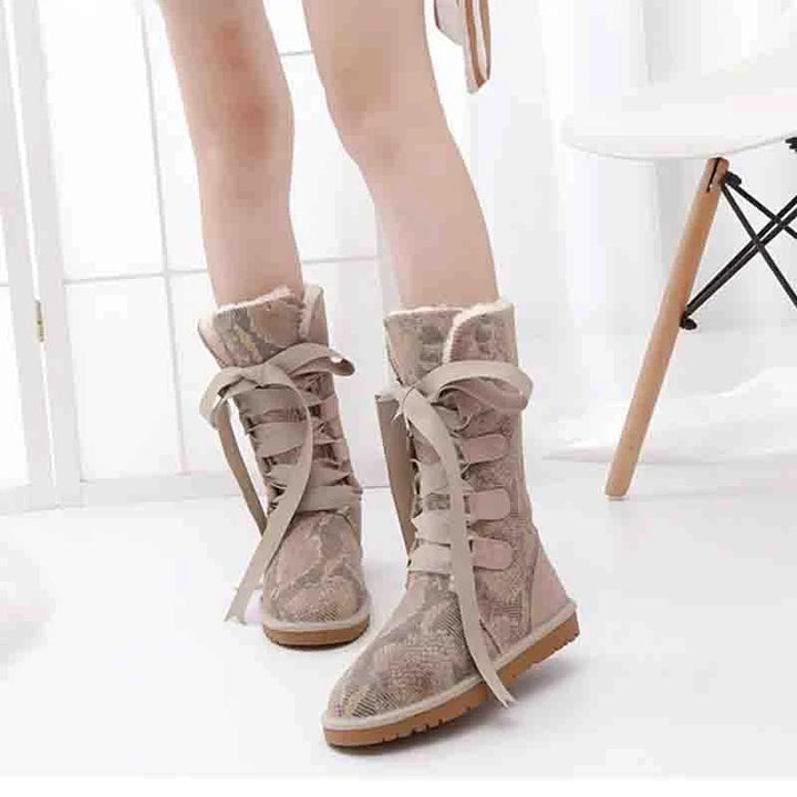 Bottes d'hiver chaudes pour femmes, avec lacets décoratifs et semelle antidérapante, confortables pour la neige.