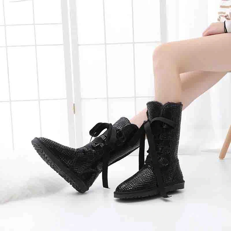 Bottes femme montantes chaudes et antidérapantes pour l'hiver, avec lacets en rubans, pour neige et style.