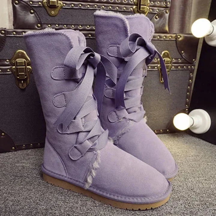 Bottes hivernales élégantes pour femme, avec lacets, chaudes et confortables pour affronter le froid.