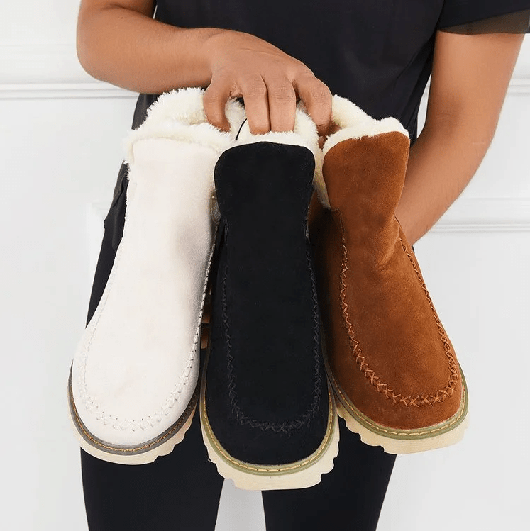 Bottes d'hiver femmes offrant confort, chaleur et sécurité grâce à leur semelle antidérapante, idéales pour la neige.