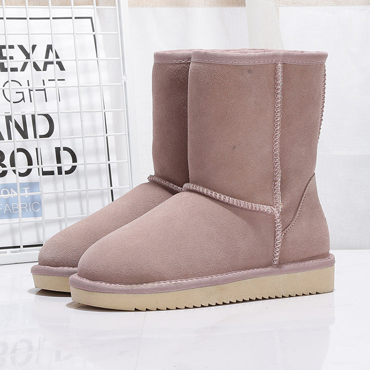 Bottes d'hiver femmes en matière imperméable, chaudes et stylées, avec semelle adhérente. Mi-mollet.