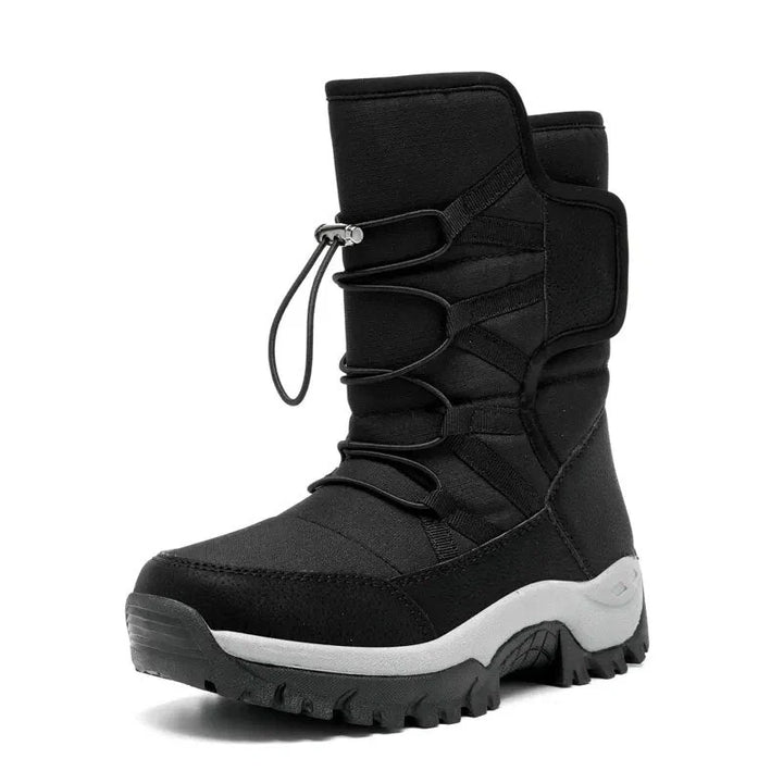 Bottes mode femme pour l'hiver, hautes et imperméables, offrant chaleur et protection contre la neige.