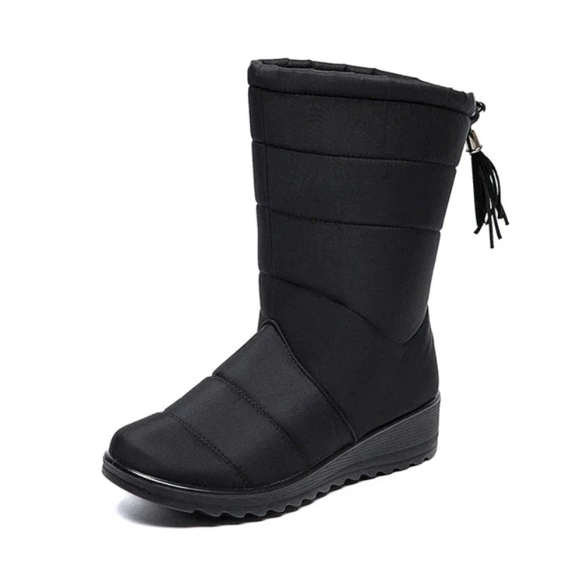 Bottes hautes pour femme, confortables et élégantes, parfaites pour affronter la neige et le froid.