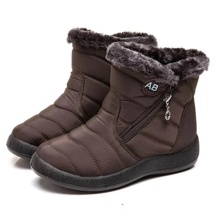 Bottes d'hiver matelassées imperméables pour femmes, doublées de fourrure. Idéales pour la neige et le froid.
