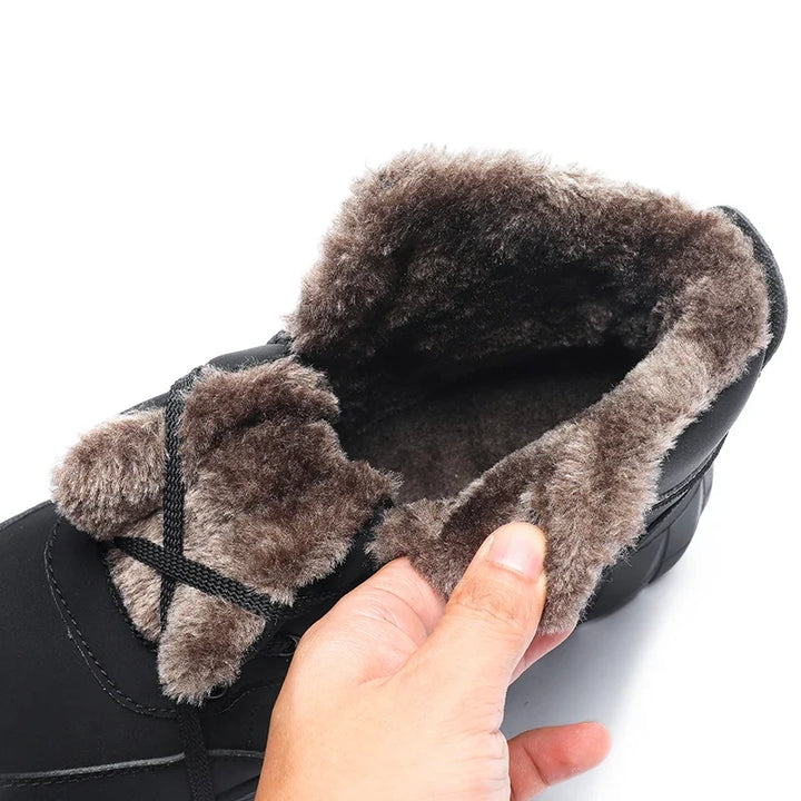 Chaussures d'hiver robustes homme, idéales pour randonnée en montagne et trekking sur neige. Confort et adhérence.