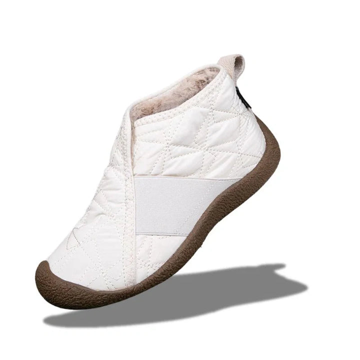 Bottes de neige femme chaudes et imperméables, doublure peluche, idéales pour l'hiver 2025.