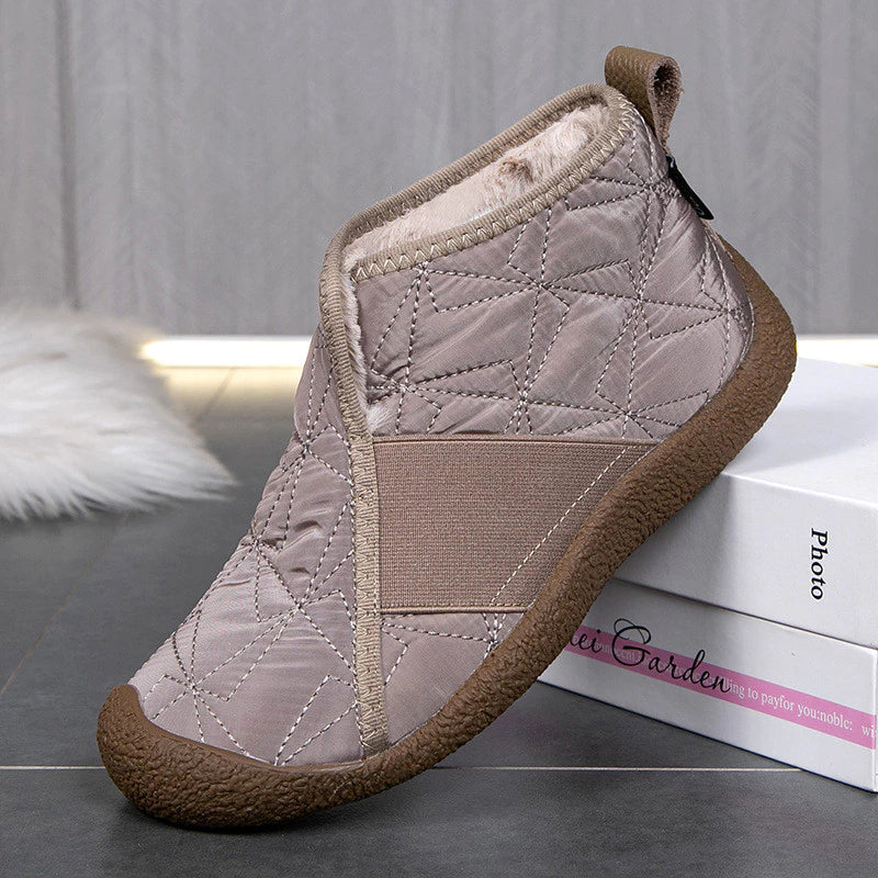 Bottes femme hiver, imperméables et confortables, idéales pour la neige ou les activités extérieures.