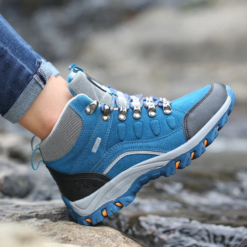 Chaussures de trekking bleues unisexes, imperméables, robustes, parfaites pour la randonnée et le plein air.