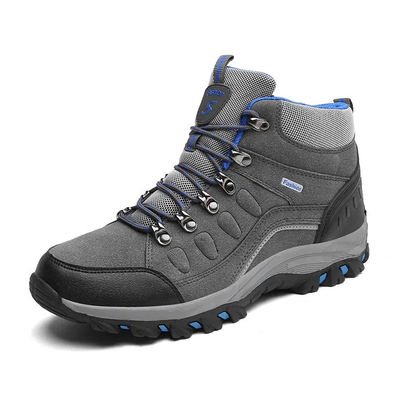 Paire de bottes de randonnée imperméables unisexes (violet/gris), confortables, prêtes pour l'aventure en plein air.