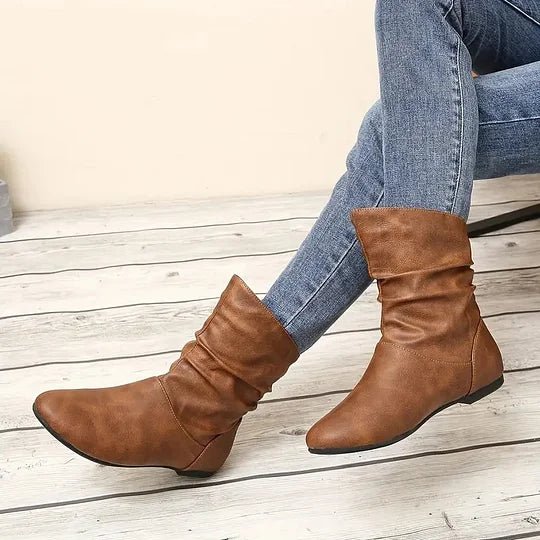 Gros plan sur la semelle antidérapante des bottes femme, assurant adhérence et sécurité par tous temps.