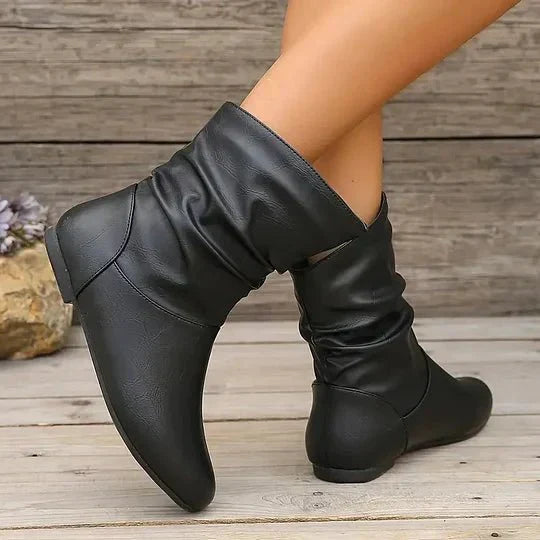 Bottes femme élégantes, avec talon stable et semelle antidérapante discrète pour un style chic quotidien.