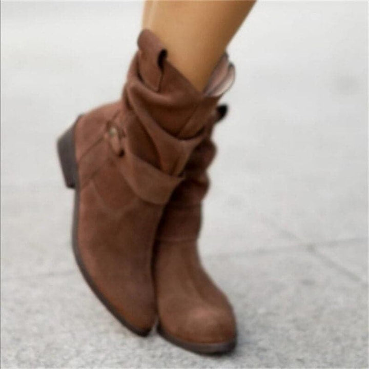 Bottes hautes femme en daim, élégantes et confortables.  Design intemporel.