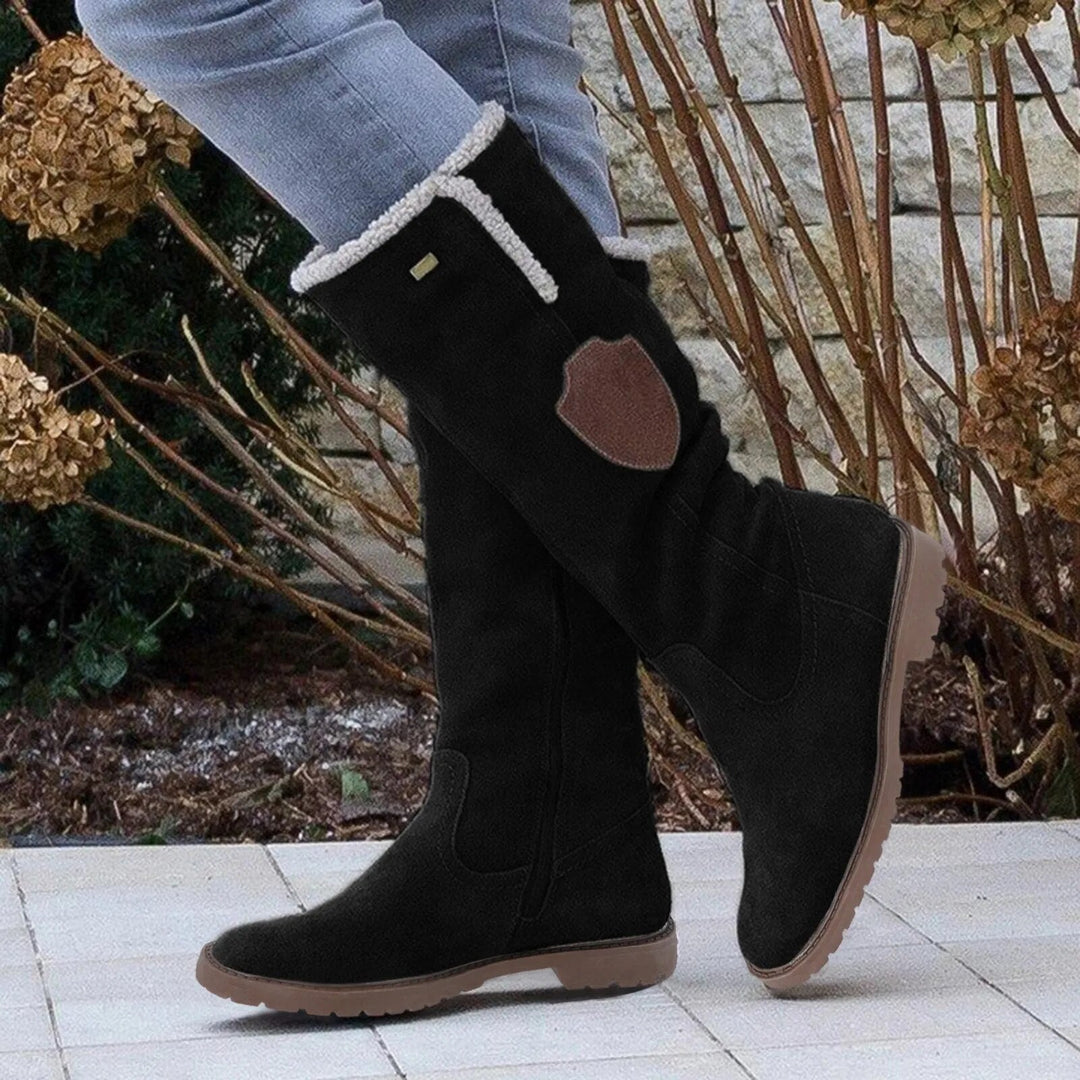 Bottes femmes élégantes, semelle antidérapante pour l'hiver. Chaussures mode, confortables et résistantes.