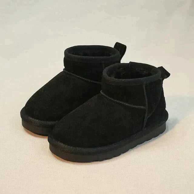 Bottines hiver femme élégantes, chaudes et imperméables. Parfaites pour la mode et le confort par temps froid.