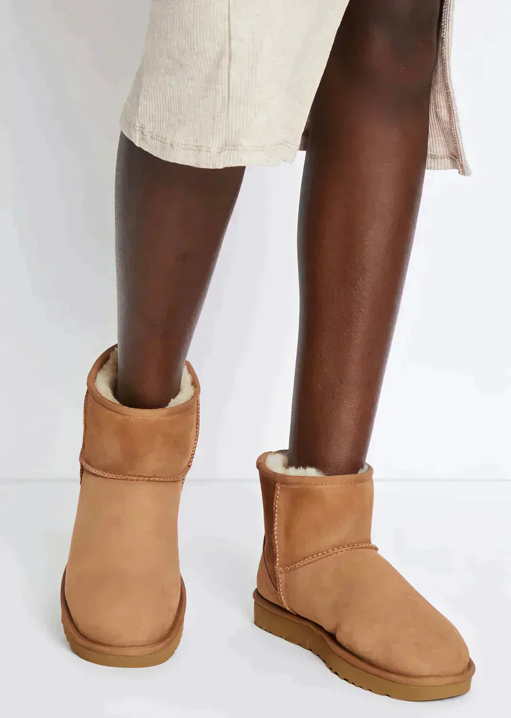 Bottes hiver femme chic et résistantes, avec isolation thermique et grip antidérapant pour les jours froids.