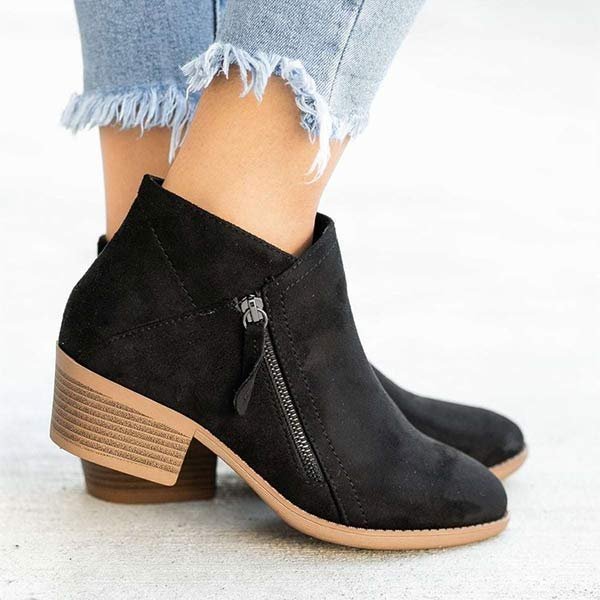 Chaussures orthopédiques à bottes pour femmes, offrant un confort optimal et une stabilité accrue. Idéales pour l'automne.