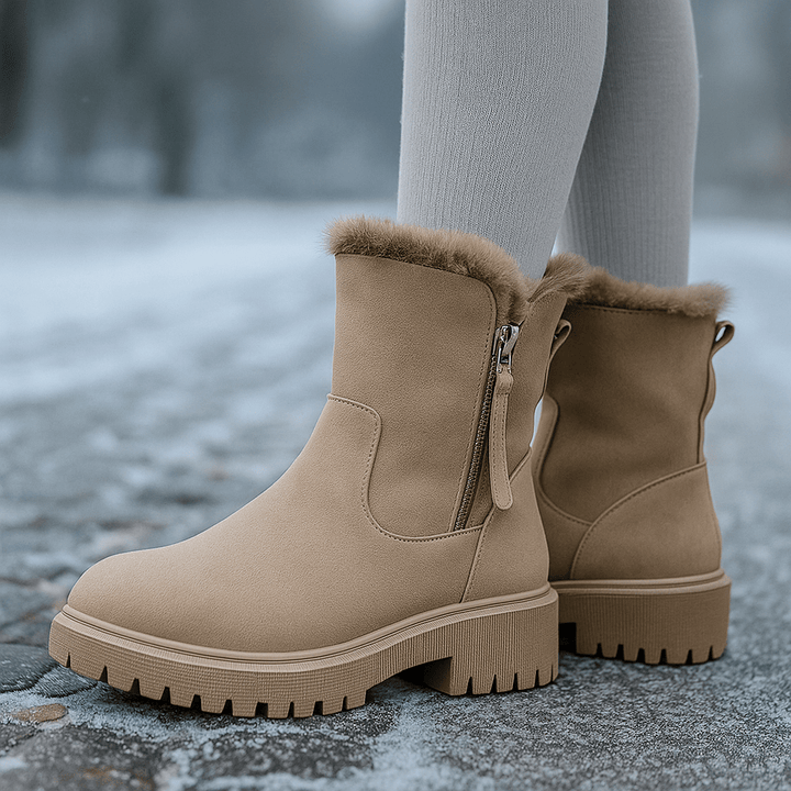Bottes thermiques élégantes pour femmes, idéales pour l'hiver, offrant chaleur et confort supérieur.