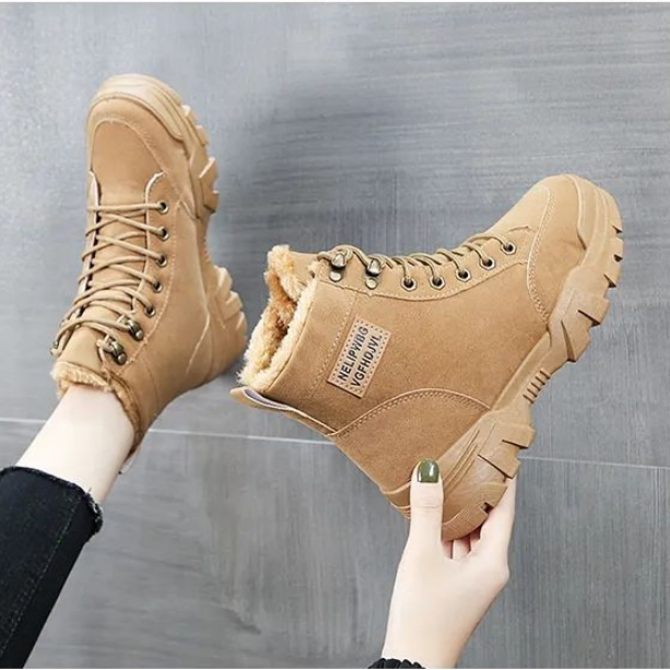 Chaussures bottes femme confortables pour l'hiver, style urbain, semelle épaisse et lacets robustes.