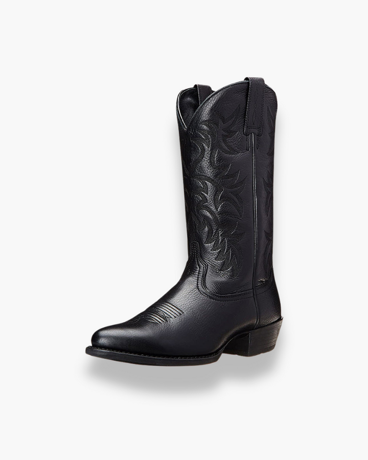 Bottes western femme élégantes avec coutures apparentes, design travaillé et coupe féminine, marron cuir authentique.