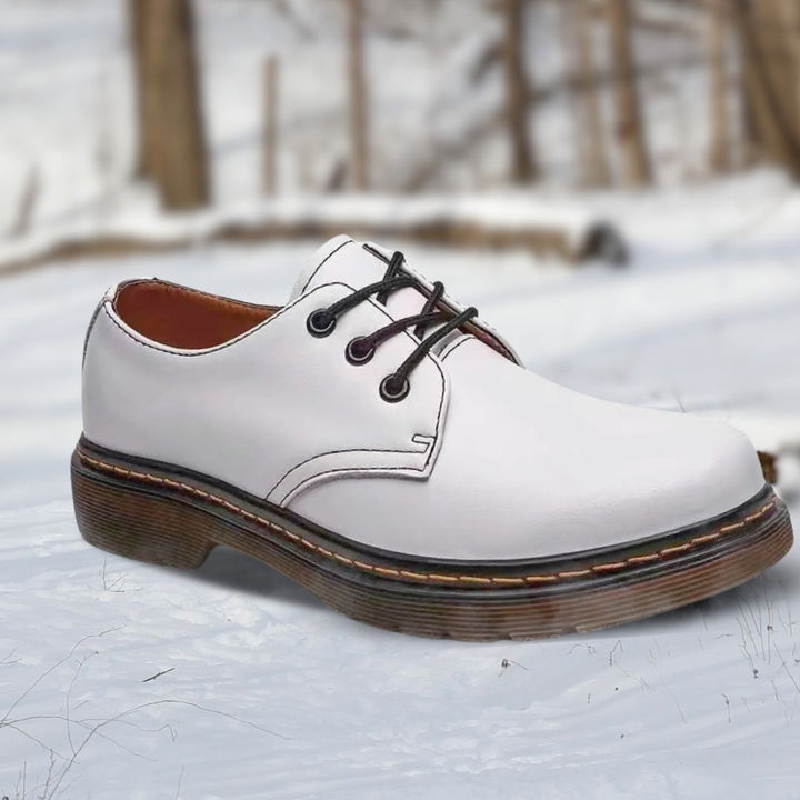 "Bottines basses en cuir élégant pour hommes, confortables et stylées, disponibles en plusieurs couleurs."