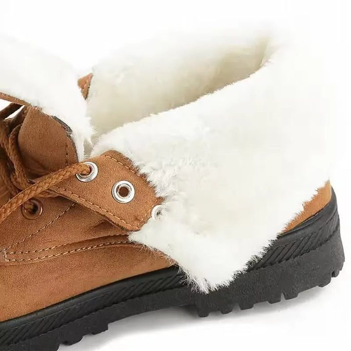 Bottines d'hiver imperméables et antidérapantes pour femmes, assurant protection et style par temps froid.