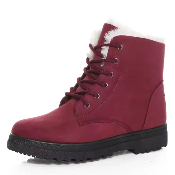Paire de bottines chaudes et imperméables en daim pour femmes, avec design élégant et confort durable.