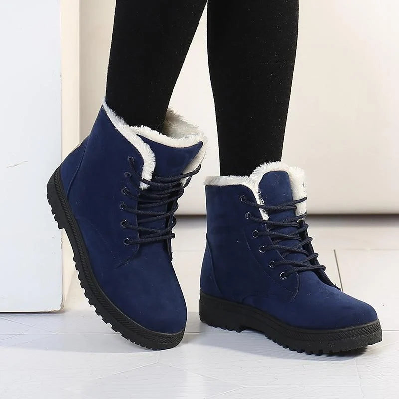 Bottines en daim noir pour femmes, imperméables et chaudes, parfaites pour affronter le froid de l'hiver.