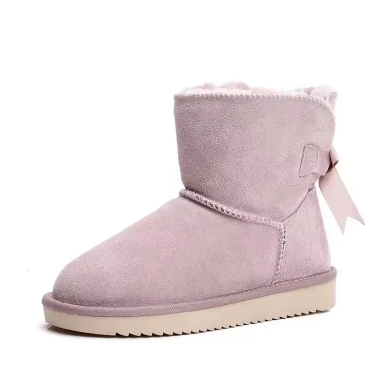 Bottines d'hiver chaudes en daim et fourrure pour femmes. Confortables, élégantes et antidérapantes pour la neige.
