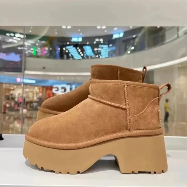 Bottillons d'hiver femme avec plateformes robustes et semelle antidérapante, idéales pour le confort et la sécurité.