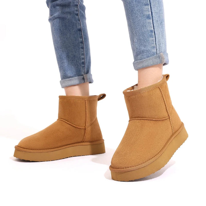 Bottines neige femme, chaudes et stylées, conçues pour un confort optimal et une protection contre le froid.