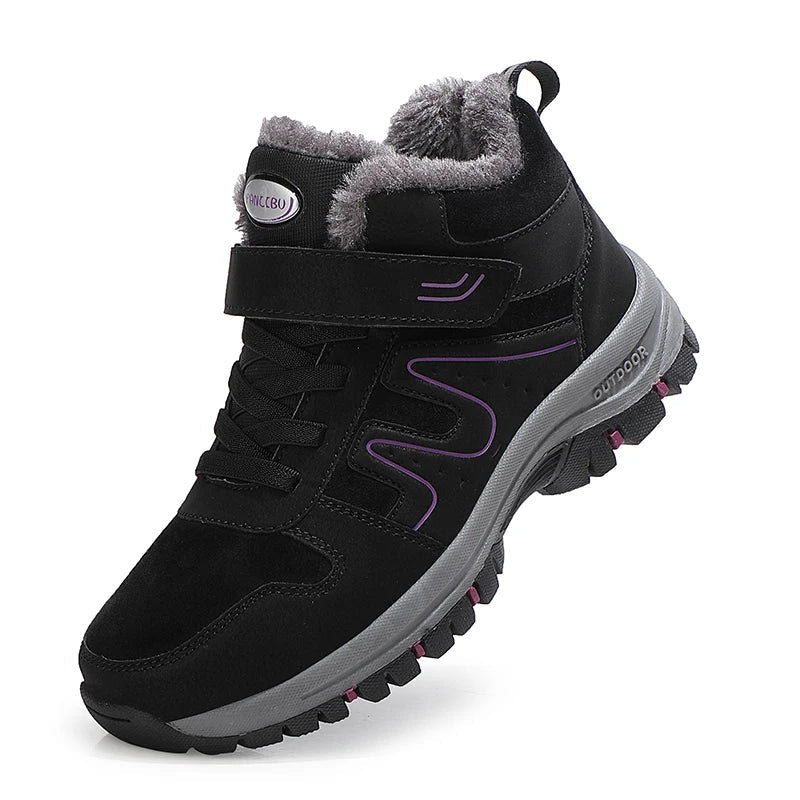 Vue latérale des bottines imperméables femme, confortables et prêtes pour la neige.