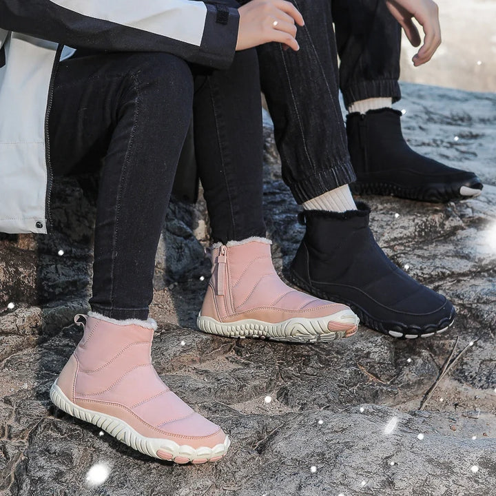 Bottes unisexes pour l'hiver, chaudes, imperméables, avec semelle flexible pour une sensation pieds nus naturelle.