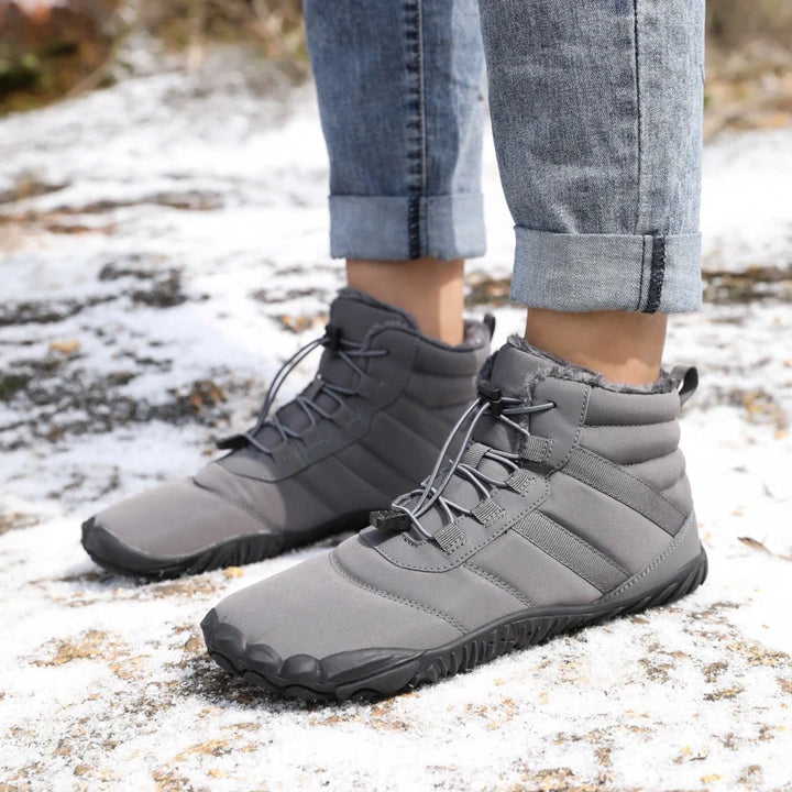 Bottines d'hiver "pieds nus" robustes, antidérapantes et imperméables, parfaites pour la neige et la glace.
