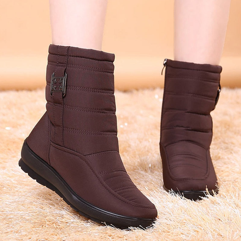 Bottines hiver femme doublées fourrure, assurant chaleur et confort maximal par temps froid et neigeux.