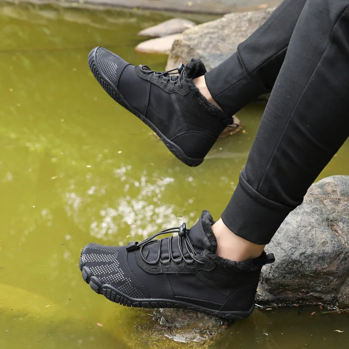 Marchez confortablement en hiver avec ces bottines minimalistes unisexes, chaudes et imperméables.