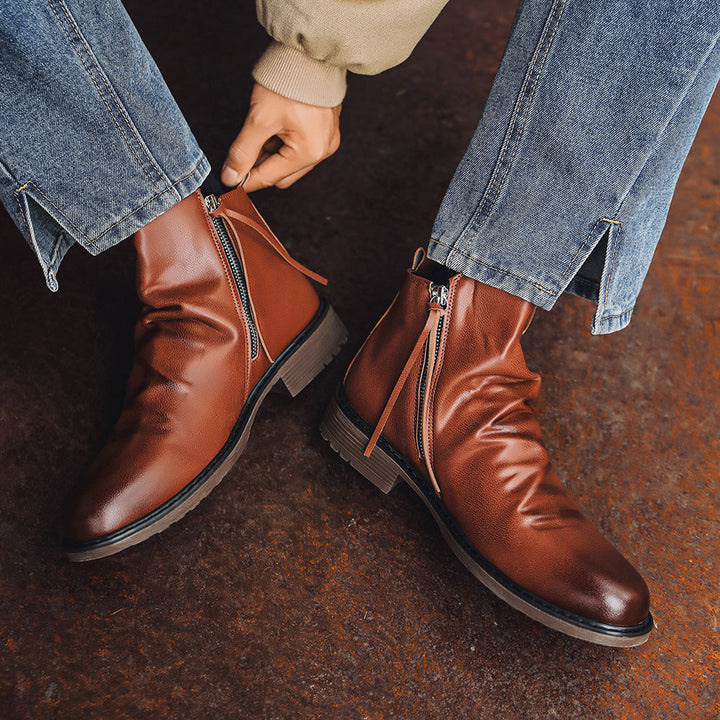 Bottines homme noires élégantes avec fermeture éclair latérale, idéales pour un enfilage rapide, mode masculine.