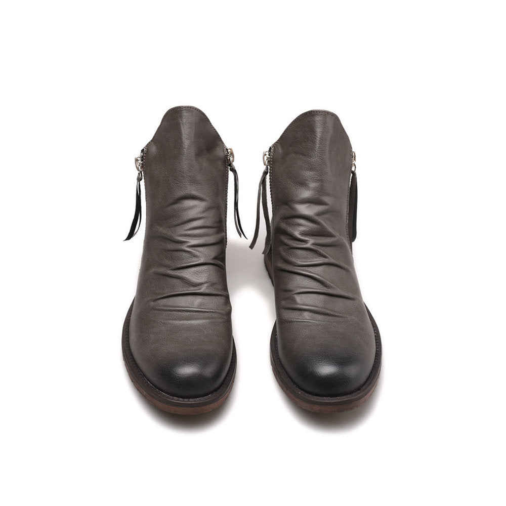 Bottines montantes homme élégantes à la cheville, avec zip pour confort, style urbain mode masculine.