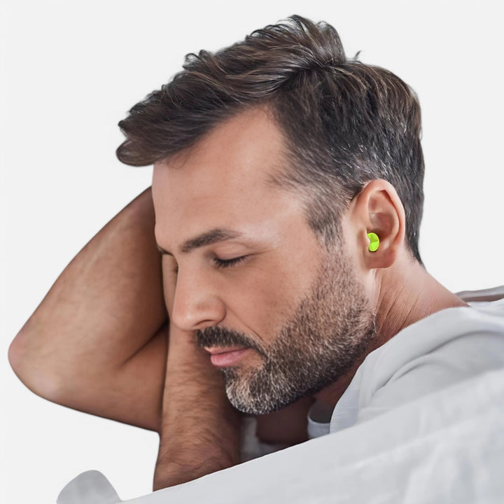 Bouchons oreilles insonorisés, confort optimal.  Réduction bruit, sommeil paisible.